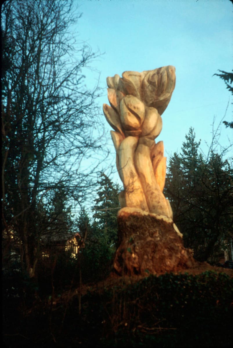 "Untitled Monument" by Kent Mikalsen  Image: Carved from a 21' poplar stump for a private commission. It stands on a hillside overlooking Bellingham Harbor.