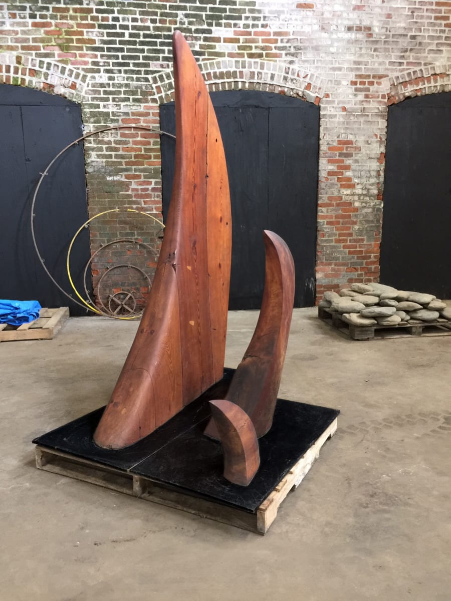 "Untitled Group", by Kent Mikalsen  Image: Organic minimalist sculpture formally in theTD Bank in North Adams, MA. Constructed from 200 year old laminated pine beams that were discarded during the renovation of the former Sprague Electric Plant now the Massachusetts Museum of Contemporary Art..