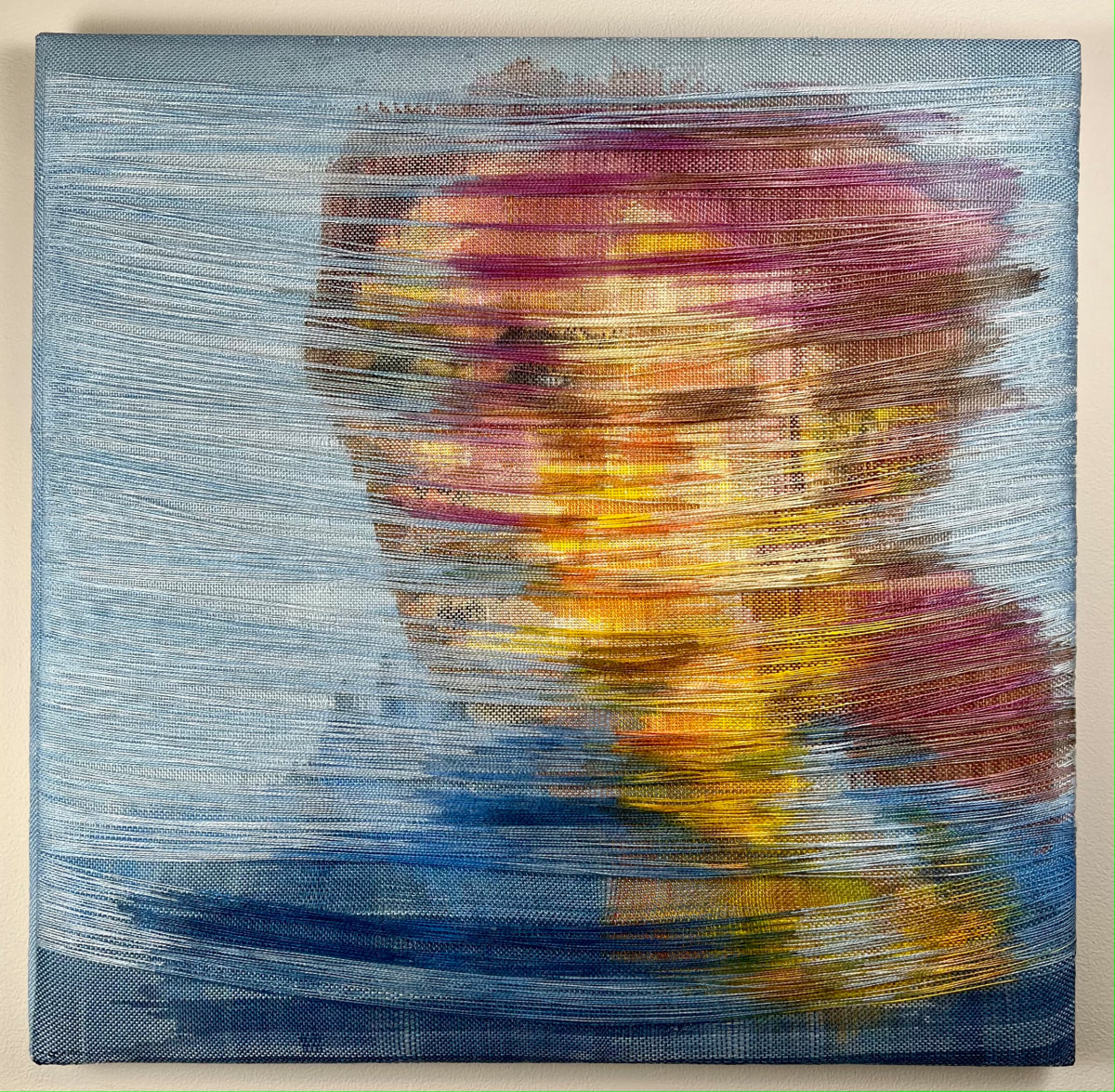 Dormant by Melissa English Campbell  Image: Dormant. 2023. 20 ½”  x 21”. Warp and weft painted woven tapestry. Portrait of a woman looking sideways into the distance.  Running in the foreground are long yarns loosely mirroring her silhouette.
