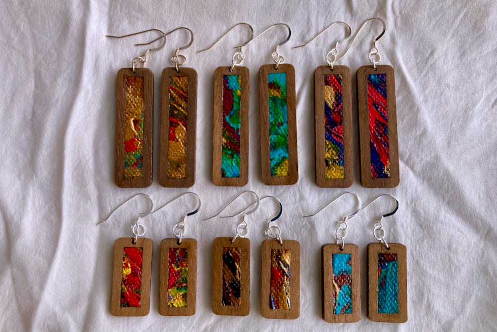 Wood Earrings with Canvas Inserts by Mark Johnston  Image: 6 pairs of Earrings.  Custom painted Canvas, Walnut, Stirling Silver Ear Hooks and Jump Rings.