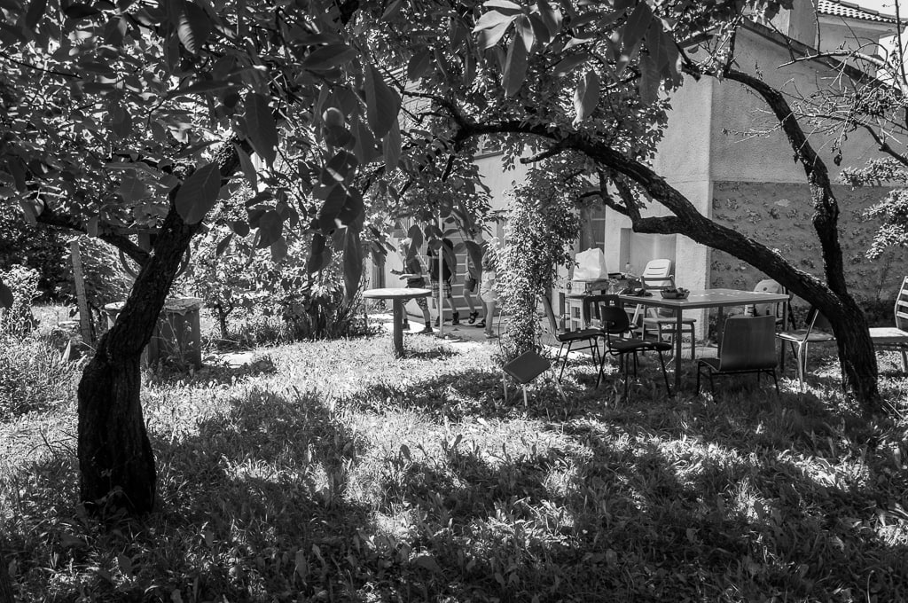 Cousins playing in my father’s garden by Kate Brogdon 