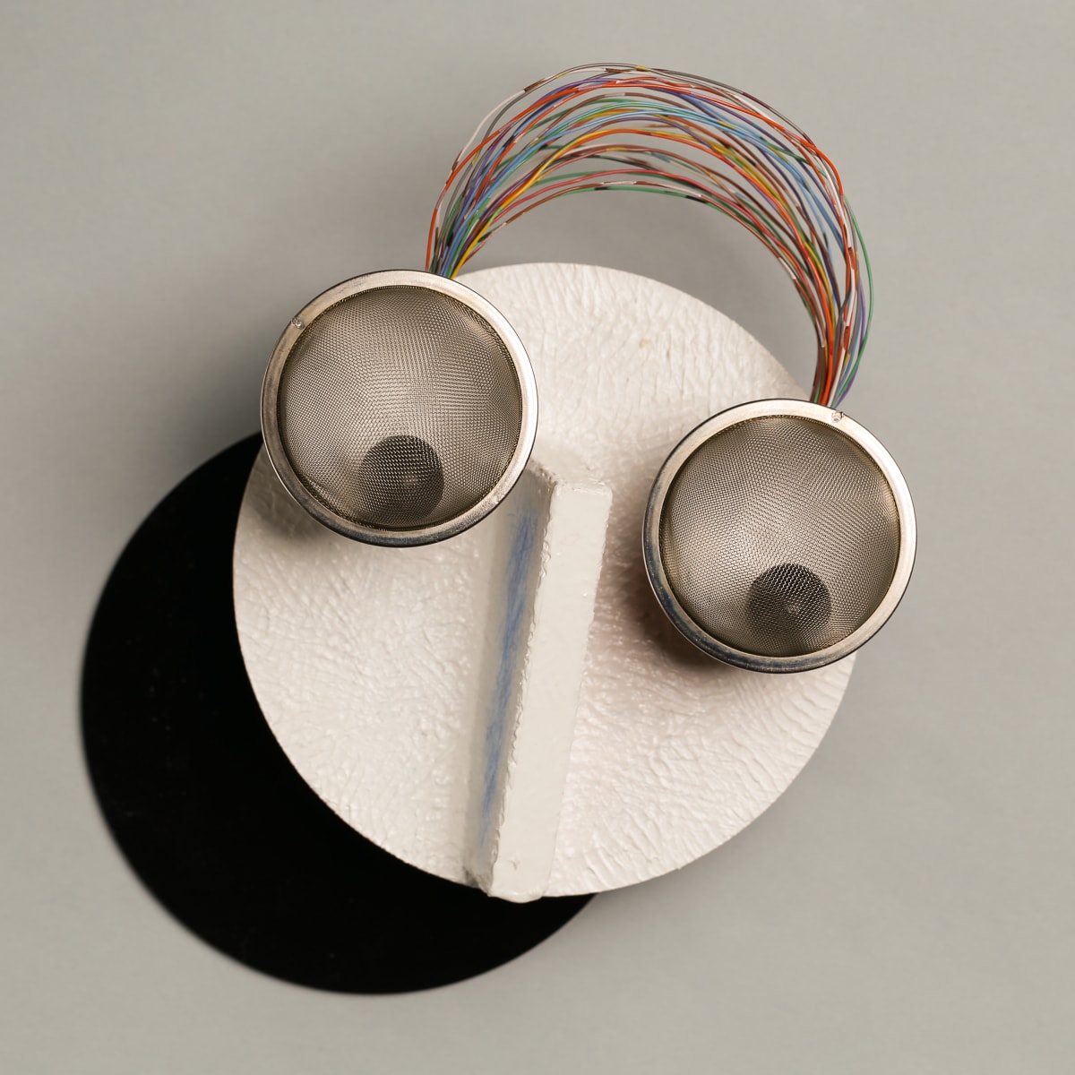 Wall Device for viewing both sides by Charles H. Stinson 