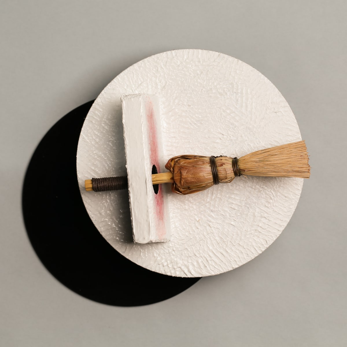 Wall Device #2 for painting small messages on the other side by Charles H. Stinson 