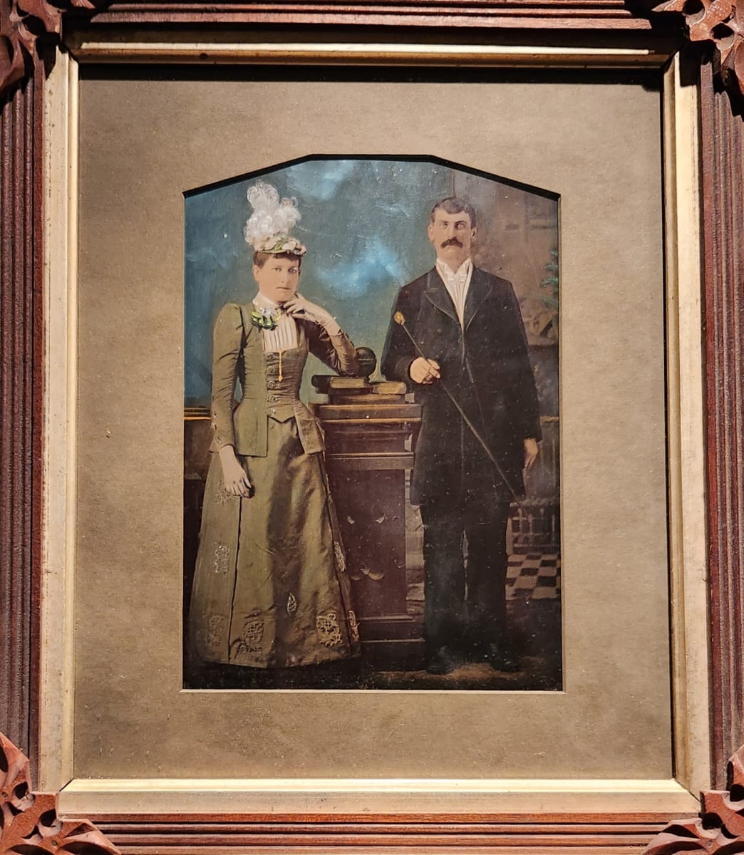 Elegant couple with studio backdrop 