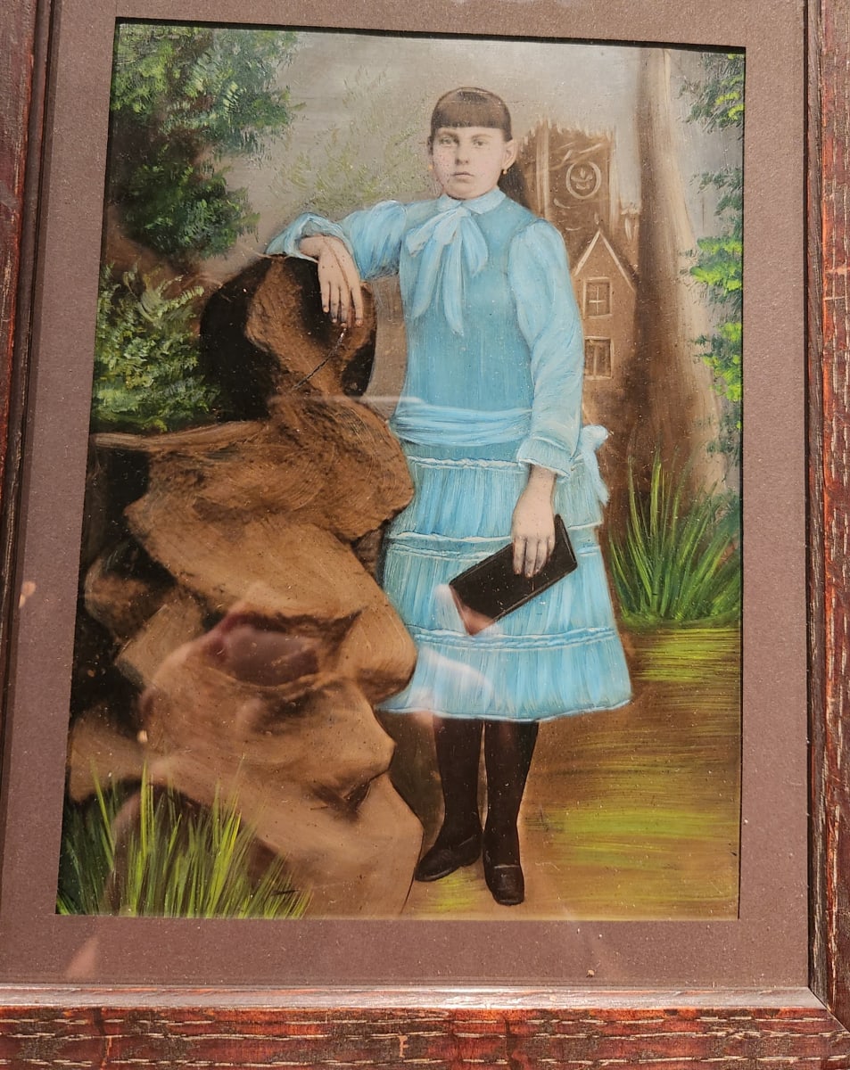 Young woman in front of church at rock podium 