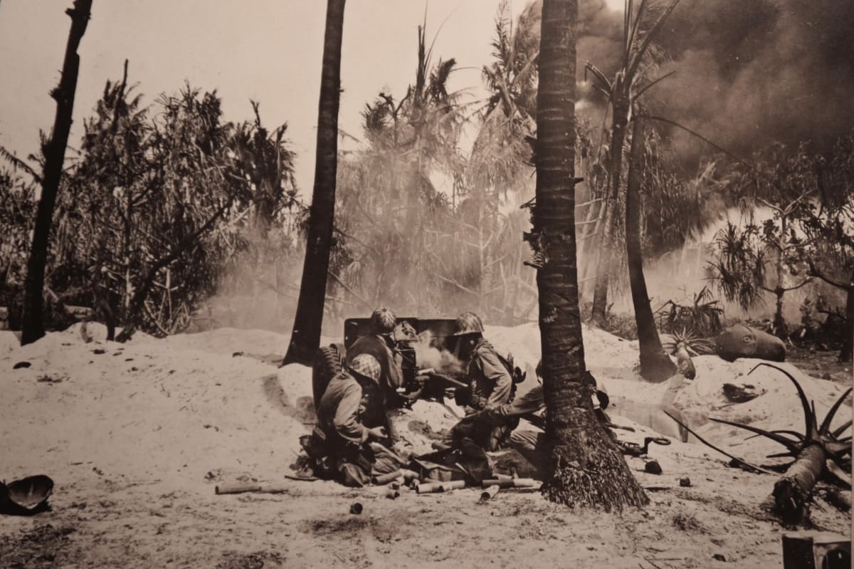 WW II Pacific Island Combat  Image: Military photograph during active engagement in Pacific Island assault.