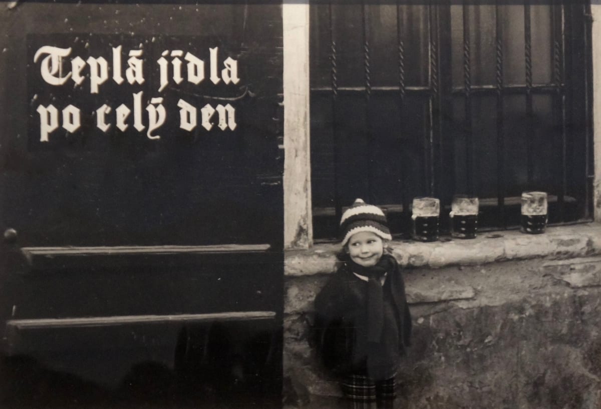 "A chicken in every pot", Prague by Stanislav Tuma  Image: Translation of sign on door outside pub and child waits for parent per wife of artist.