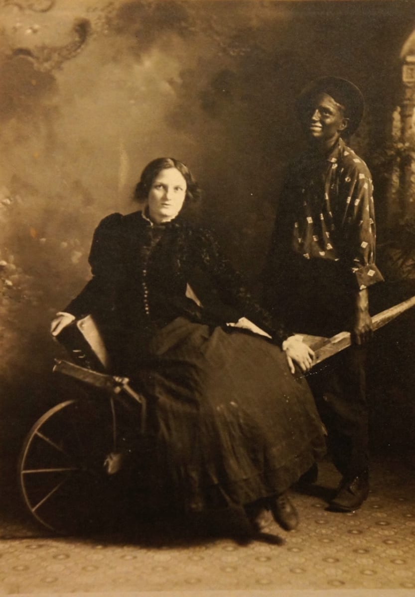 Two women, one in blackface 