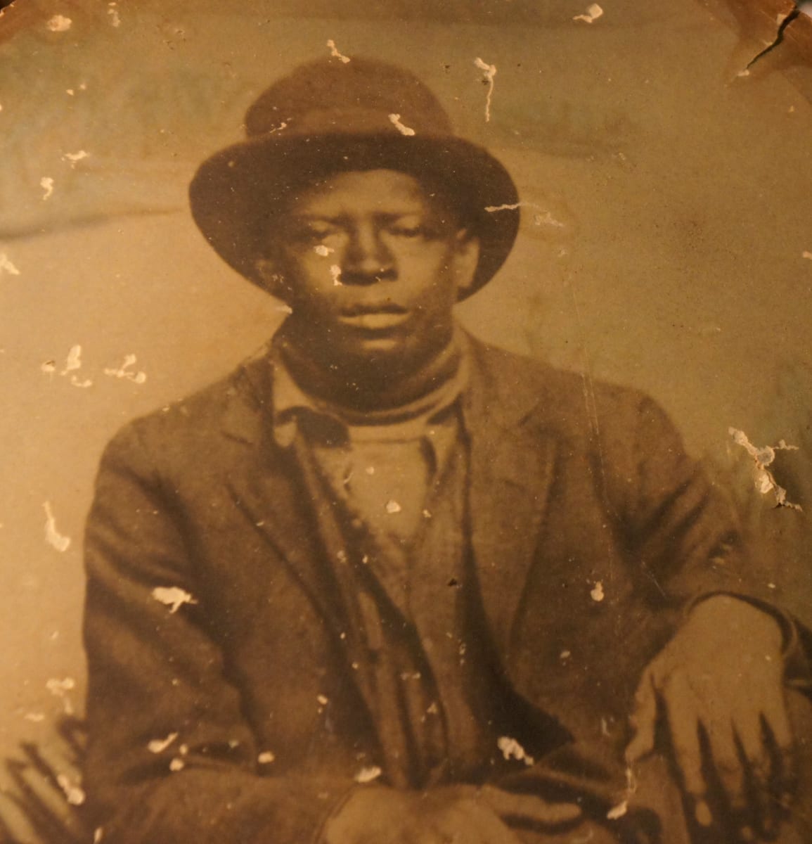 Distressed photo of young man 