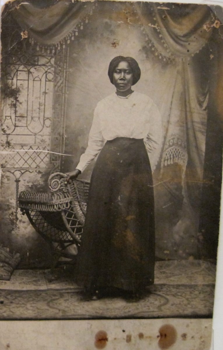 Studio portrait with elaborate painted backdrop 