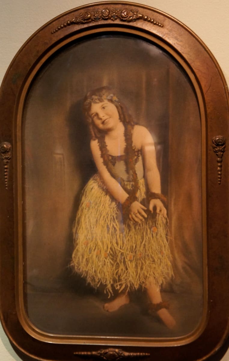 Young girl in grass skirt 