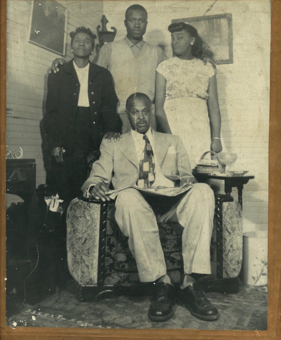 Family Portrait, Mound Bayou, MISS by R. Lee Thomas  Image: One of 2 silver gelatin photos mounted on cardboard frames. Stamp on verso: R. Lee Thomas. Mound Bayou, MISS. "The oldest Negro town in American."