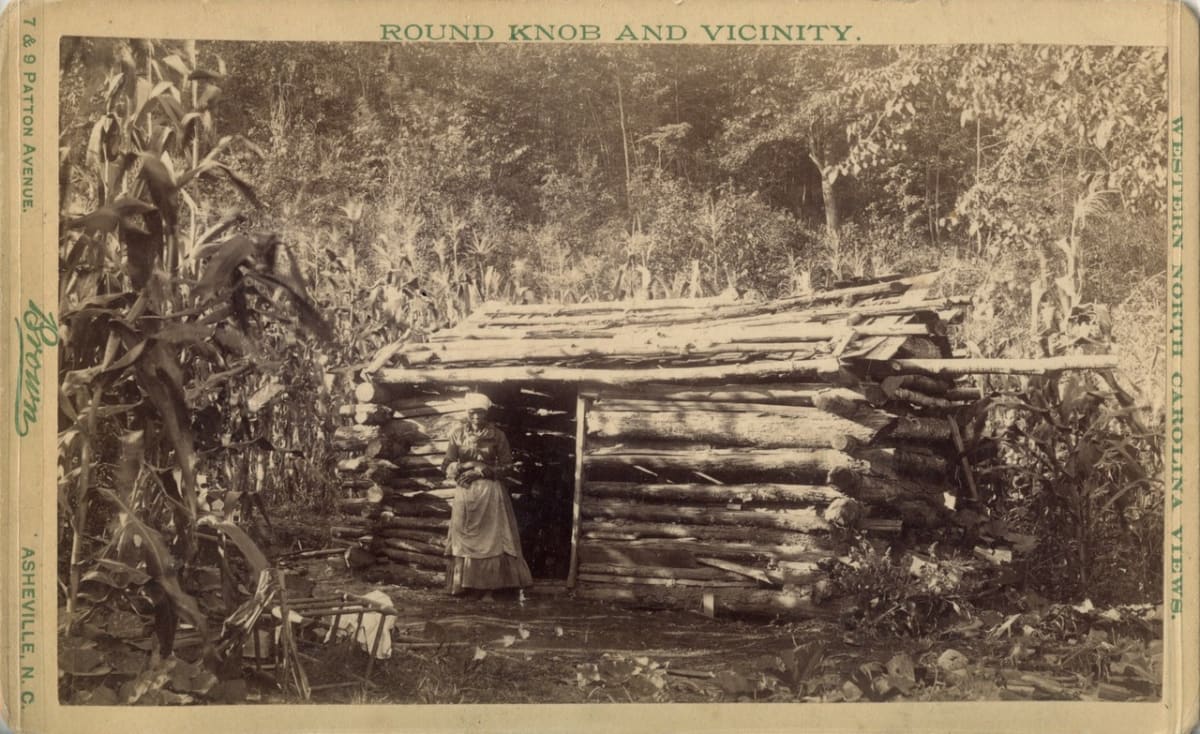 Crude cabin in North Carolina mountains  Image: Boudoir card: Round Knob and Vicinity. Western North Carolina Views. Brown. Asheville, NC.