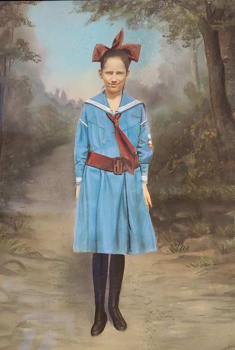 Young woman in camp uniform 