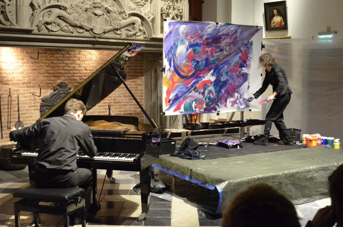 Chopin Ballad no.4: musicpaintingLIVE (2016) by Maryleen Schiltkamp  Image: With pianist Reinis Zarins at Markiezenhof, Bergen op Zoom, Netherlands, 2016