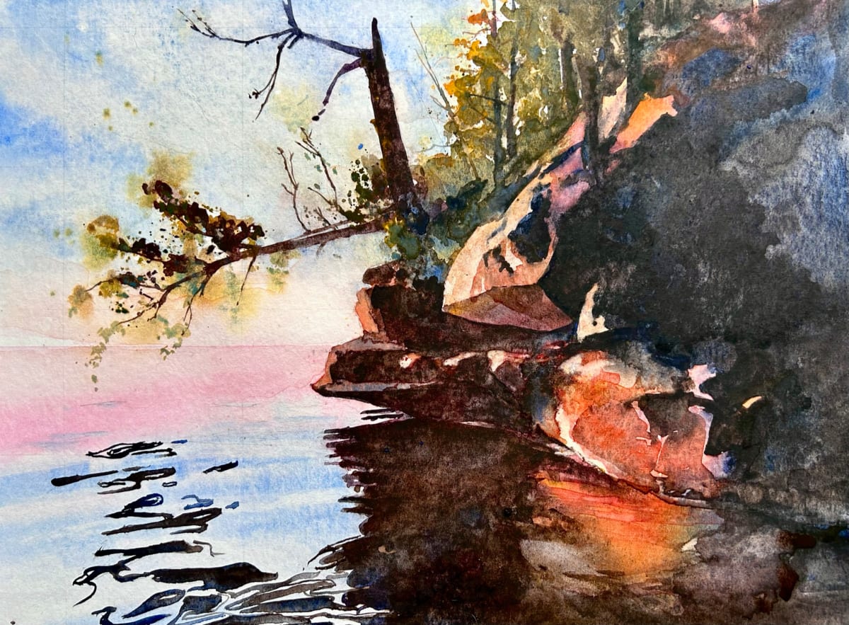 Sunrise in Quiet Cove by Dale Whittaker  Image: A resilient tree reaches out over the sandstone ledge to welcome the sunrise in a quiet cove in the Apostle Islands. 