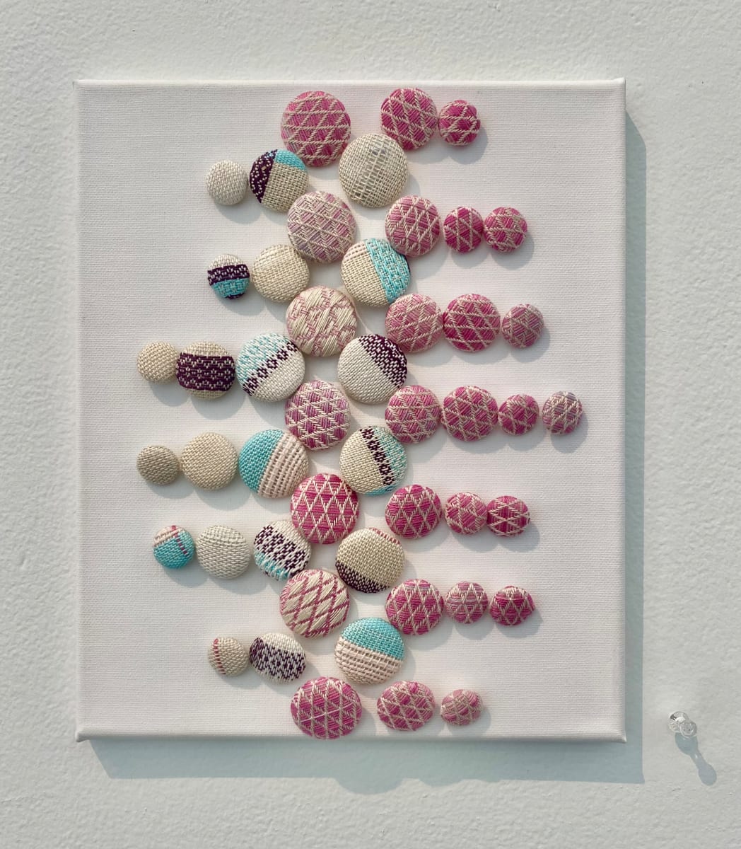 Pink buttons by Perry Gross 