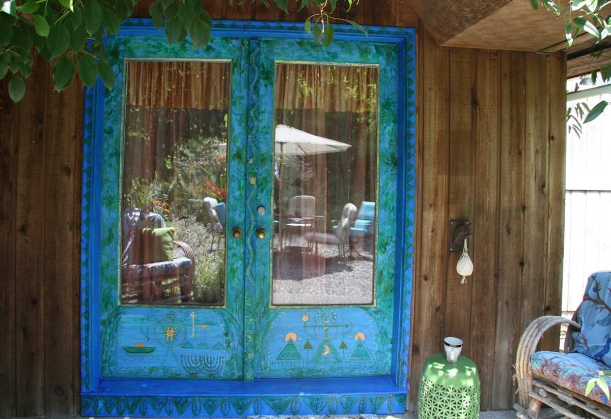 Painted front doors, artist's home in Cascade Mountains by Denita Benyshek 