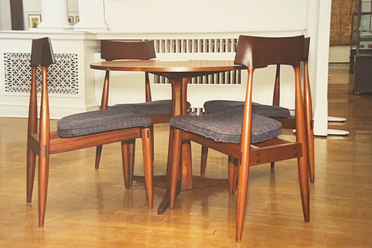 Round Pedestal Table with 4 Stacking chairs by Aaron Rosenstreich  Image: Round pedestal table with 4 chairs, installation view, 1995 Solo Exhibition, Norwich Free Academy