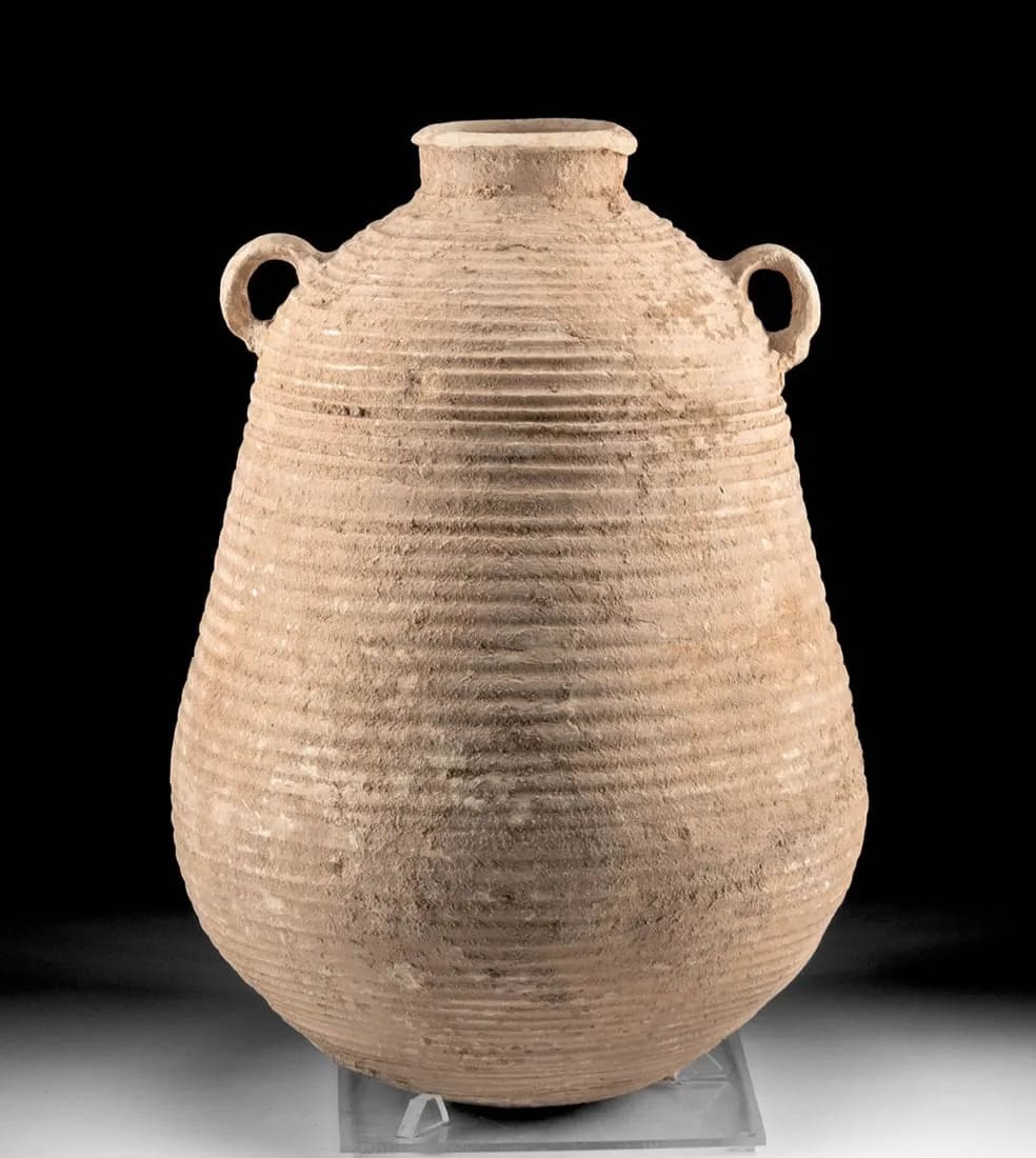 Eastern Roman or early Byzantine Empire coil-formed pottery amphora with a piriform body 