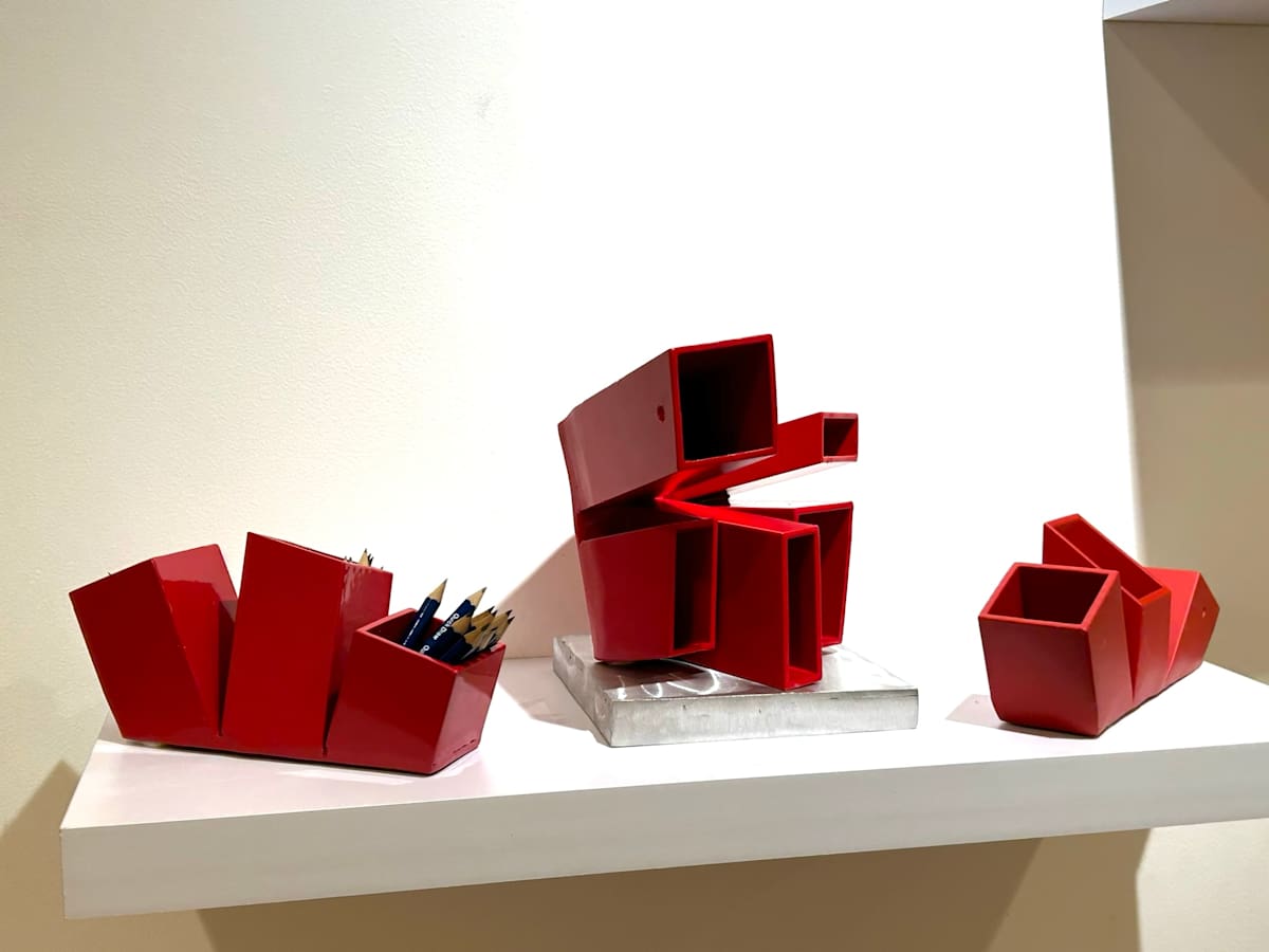 red organizer installation by Vivien Collens 