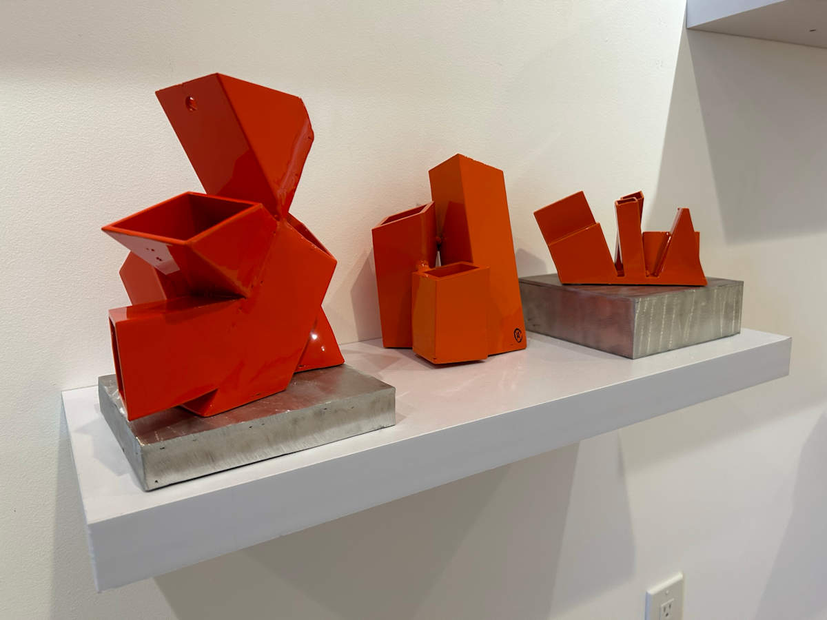 orange organizer installation by Vivien Collens 