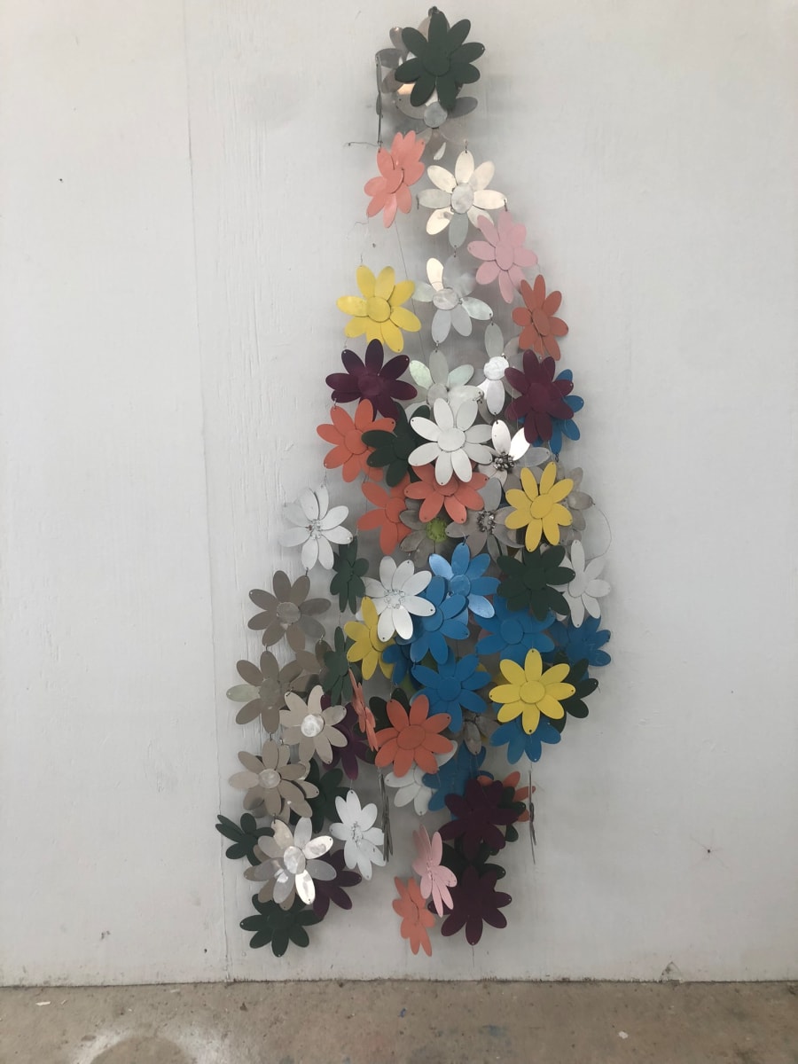 cascade. by Vivien  Collens  Image:  this is a  prototype for a commission. a cascade  of aluminum flowers  , each flower is made of handwelded laser cut components. painted with enamel paint.  The flowers are connected by wire, and can be rearranged to fit various spaces . They could also be powdercoated prior to arrangement, this would be more durable and more expensive.