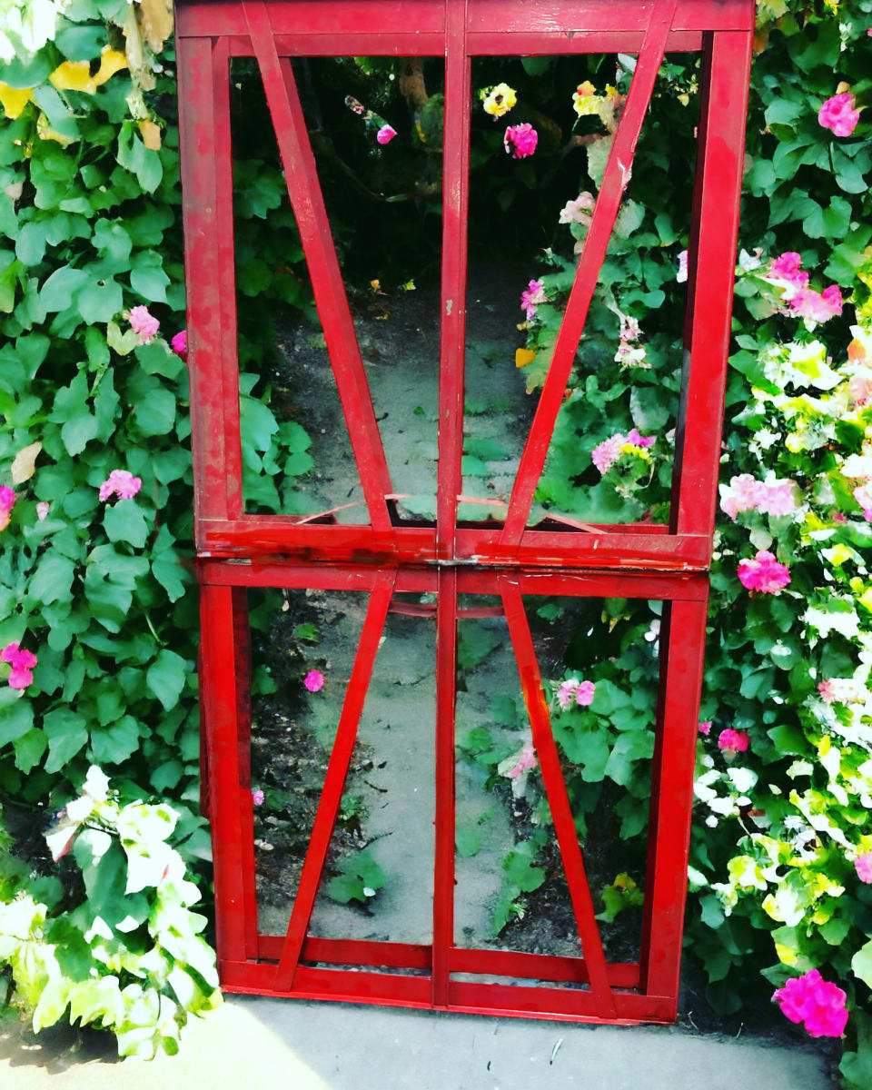 Garden gate .    60 x 40 x 4" by Vivien  Abrams Collens  Image: garden gate, or door made from salvaged metal  firehose holder.  This can be powdercoated or painted any color and customized as a  gate or glass topped table.
Currently it is a freestanding sculpture,  anchored to a steel base
