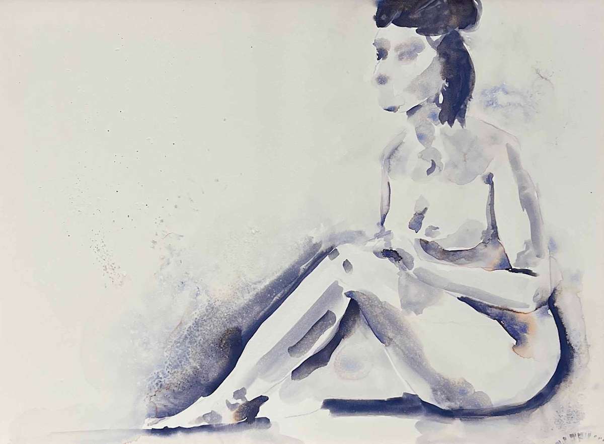 Figure in Contemplation by Mary Mastren-Williams  Image: The artwork is a watercolor painting depicting a seated nude figure. The style is impressionistic, with fluid brushstrokes and a limited color palette featuring shades of blue, gray, and flesh tones. The figure is shown in profile, with one knee drawn up and arms resting on the knee. The expression and features are softly rendered, conveying a serene and contemplative mood. The use of light and shadow creates depth and dimension in the composition.