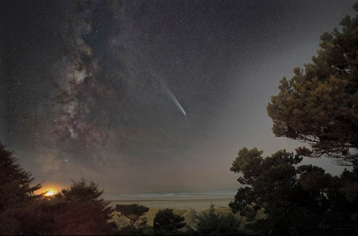 Star-crossed by Jeremy Likness  Image: Comet C/2023 A3 (Tsuchinshan-ATLAS) meanders across the twisting length of the Milky Way as both move across the Pacific Ocean at Yaquina Bay.