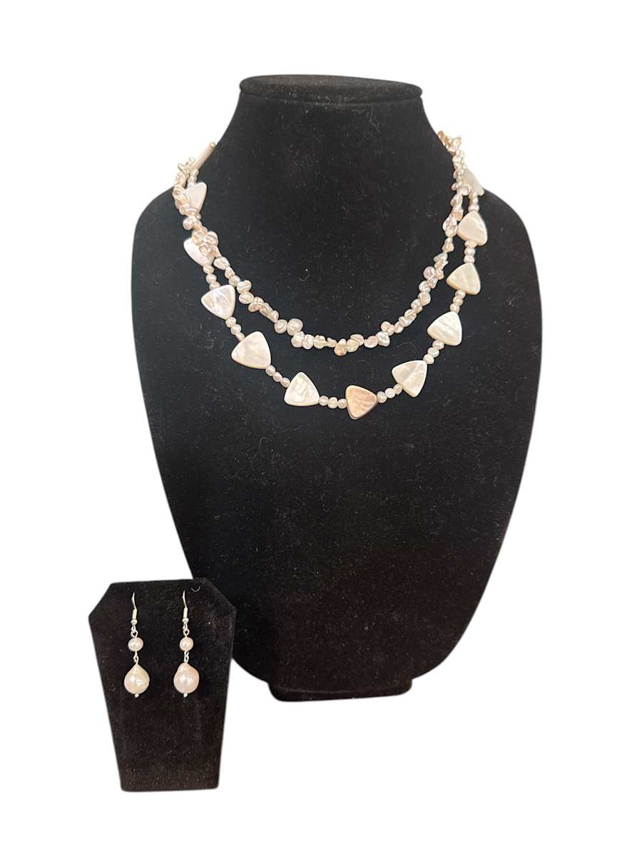Pure Elegance by Barbara Miller  Image: Mother of Pearl double strand necklace with matching earrings 