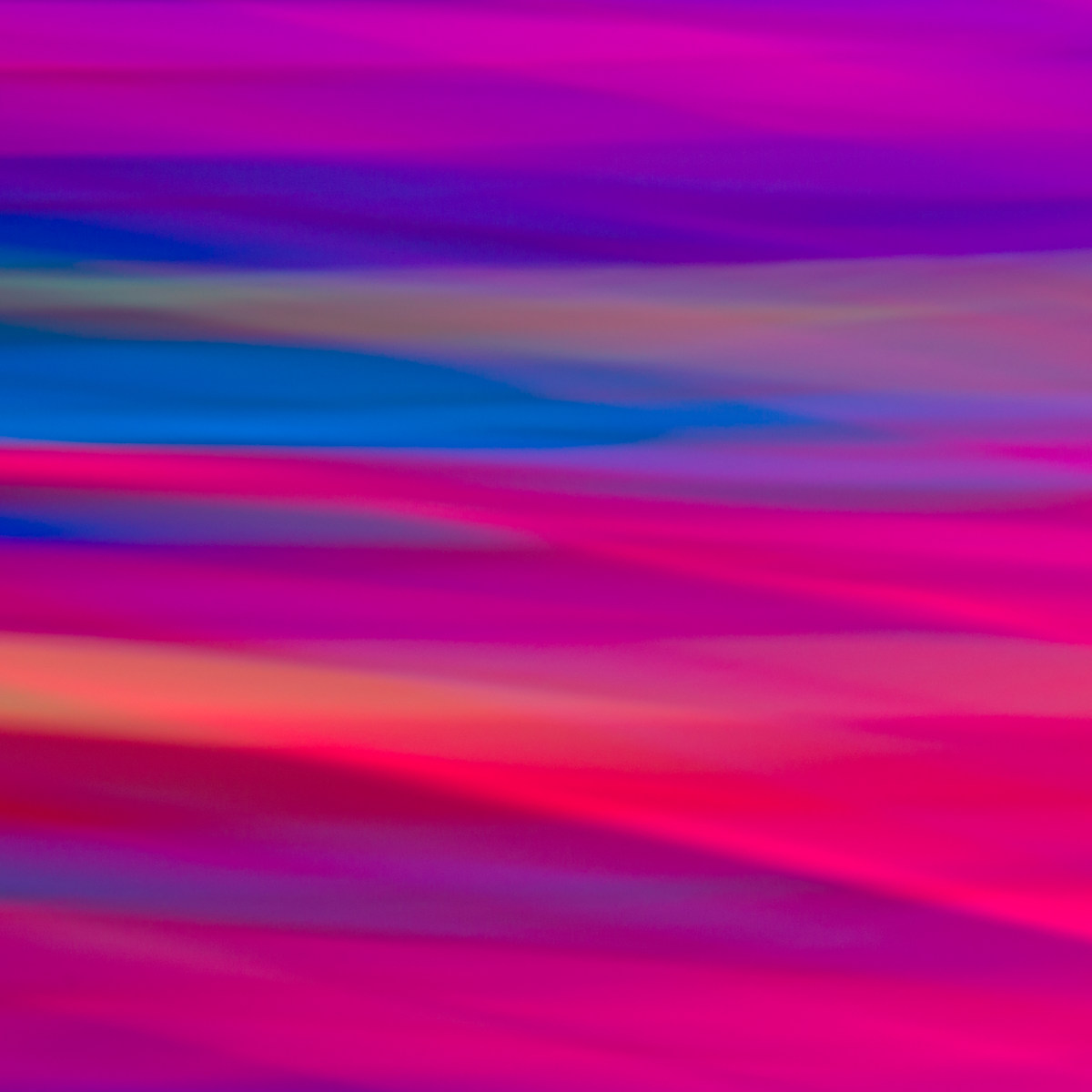 Blood Draw by Annie Beeson  Image: Long-exposure photography of video-projected light on cut paper of primary colors to blend and create completely new colors through the DSLR camera sensor and the use of small hand movements.
