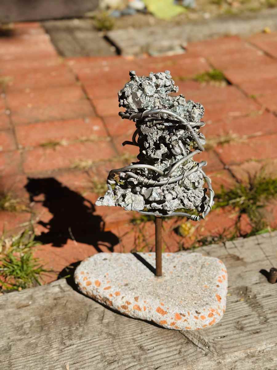 Molten Man, found in sand, on stolen land. by Ryan Hackbarth 