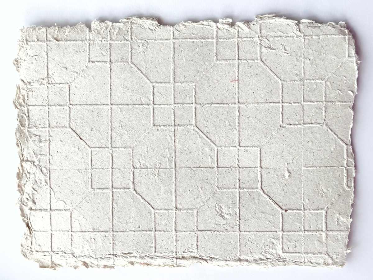 Kowloon TongLau by Elizabeth Briel  Image: A blank sheet of paper gives the illusion of a blank slate, a fresh start. In my paper casts and blind embossed prints, each the physical record of a meeting between architecture and my body, the first step's almost invisible in direct light.