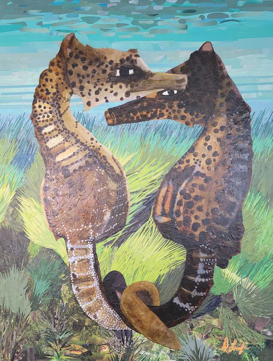 Embrace by Dawn Leigh  Image: Embrace captures two seahorses entwined in a tender dance, symbolizing love, resilience, and lifelong partnership. Crafted from repurposed paper, it reflects both the beauty of connection and the fragility of our marine world.