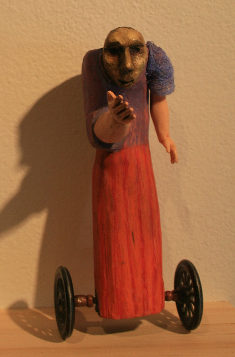 Stooped Doll on Metal Wheels by Eve Whitaker 