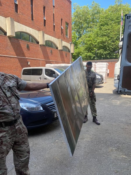 Trooping the Colour 2021 from Victoria Vestibule, Windsor Castle by Rob Pointon  Image: The regiment helping to transport the 2metre canvas from Windsor to Hyde Park Barracks