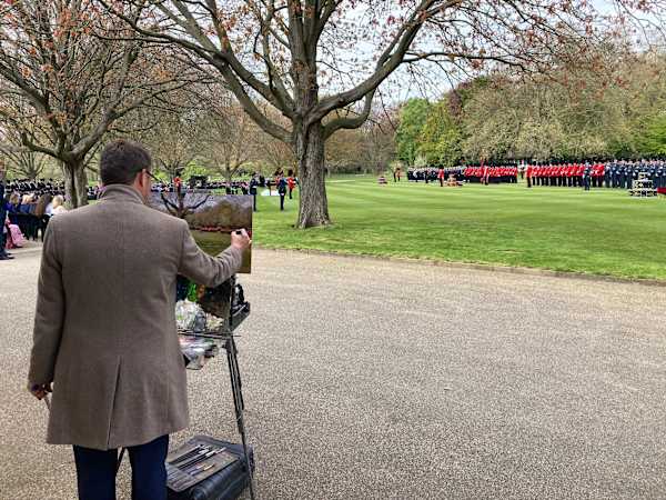 Triservice Presentation of New Standard and Colours inside Buckingham Palace by Rob Pointon  Image: Painting live during the Presentation by His Majesty King Charles III