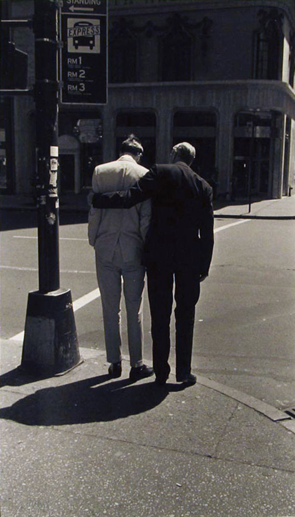 Two Men on Street Corner by N. Jay Jaffee