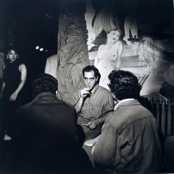 Man with Reefer - Nude on Wall, NYC, Social Context by Larry Fink