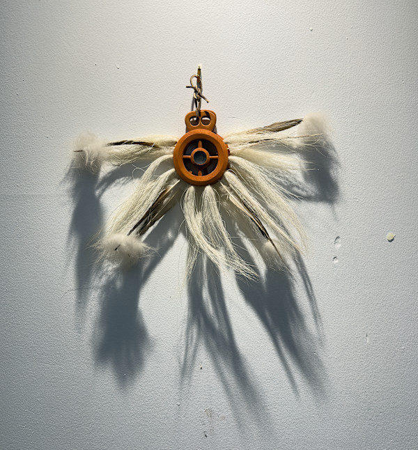 Feathers,  wood, and hair - wall piece