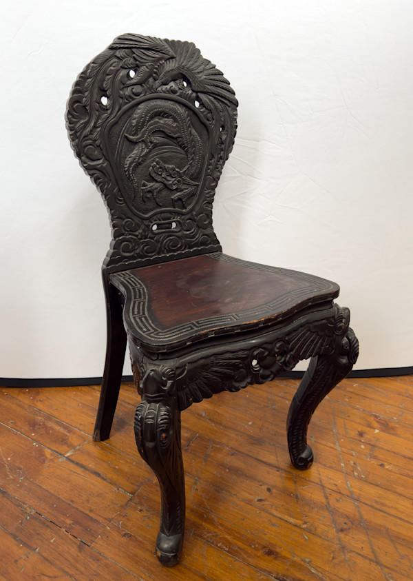 Dragon on back chair 1