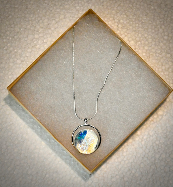 Single Opalescent arc setting necklace by Susan Mason