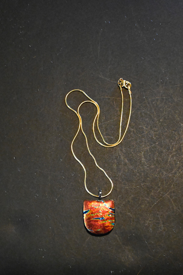 Fused dichroic glass pendant on gold plated sterling silver by Susan Mason