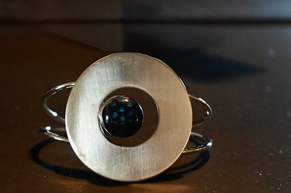 Dichroic circle cuff #2 by Susan Mason