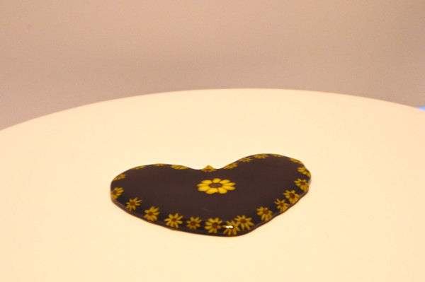 Fused Glass Heart-Shaped Sunflower Paperweight by Susan Mason, Image 1.
