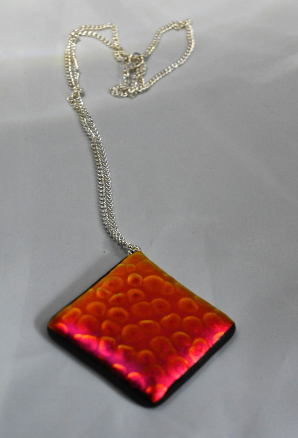 Red/gold orange dichroic pendant by Susan Mason