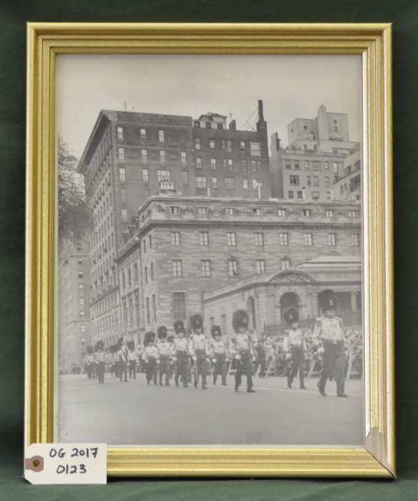 Photograph of the Old Guard Marching on the Street in Front of a Crowd
