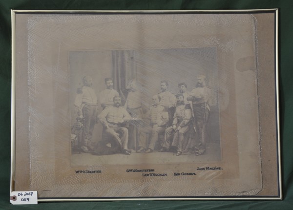 Photograph of Nine Uniformed Men