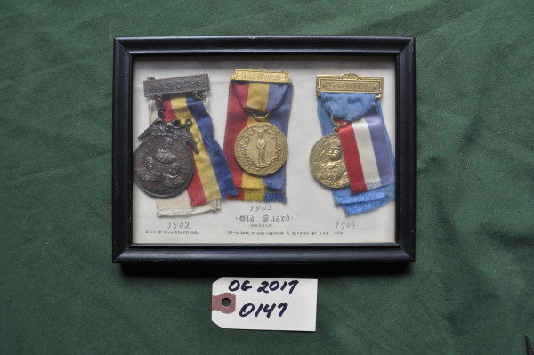 Three Boxed Medals